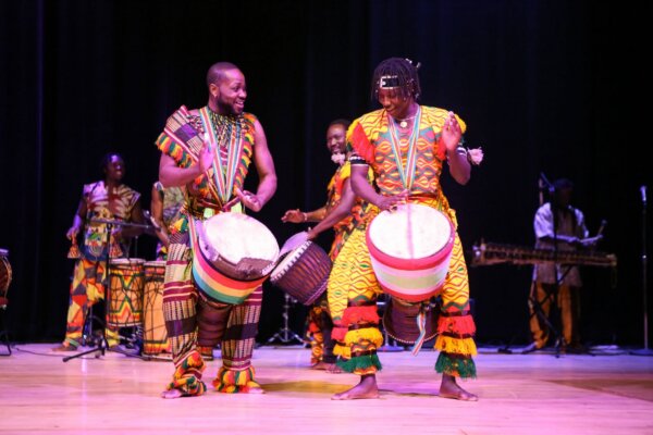 Photo of Duniya Drum and Dance performing on stage. 
