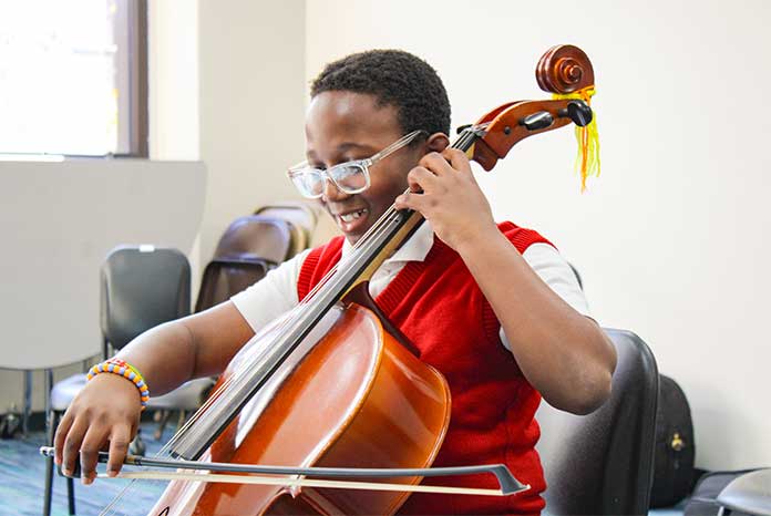 Finding His Groove Through After School Strings